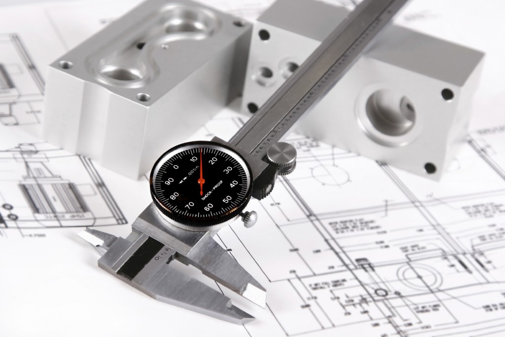 Measuring a machine part against an engineering drawing for reverse engineering